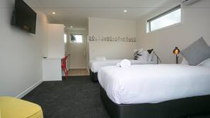 Premium bedding, blackout curtains, soundproofing, iron/ironing board
