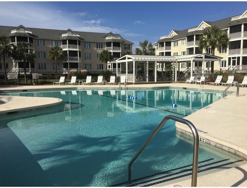 Ocean view condo with private rooftop deck in Wild Dunes, community pool