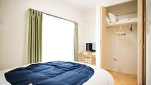 Desk, blackout curtains, free WiFi, linens