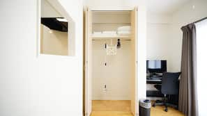 Desk, blackout curtains, free WiFi, linens