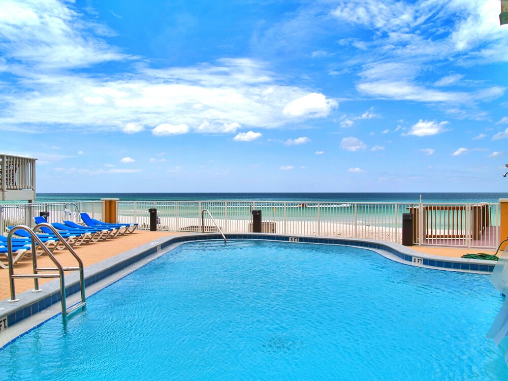 Relax and Enjoy this Tropic Winds 2/2 Condo w/ XL Balcony and Beach Service!