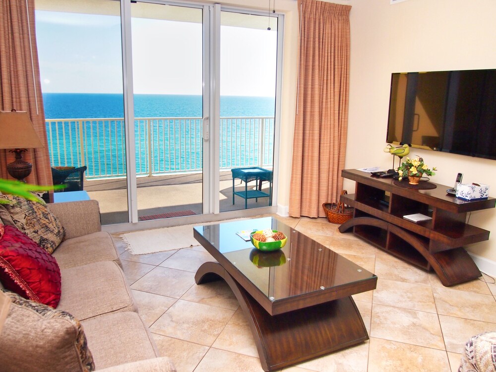 Relax and Enjoy this Tropic Winds 2/2 Condo w/ XL Balcony and Beach Service!