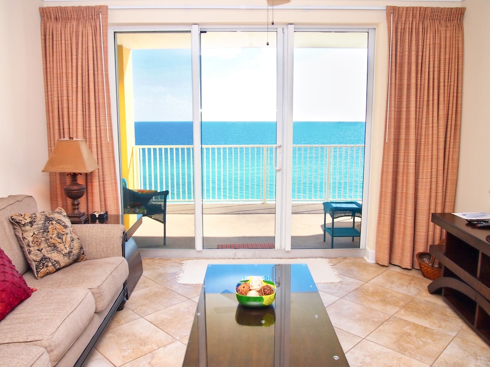 Relax and Enjoy this Tropic Winds 2/2 Condo w/ XL Balcony and Beach Service!