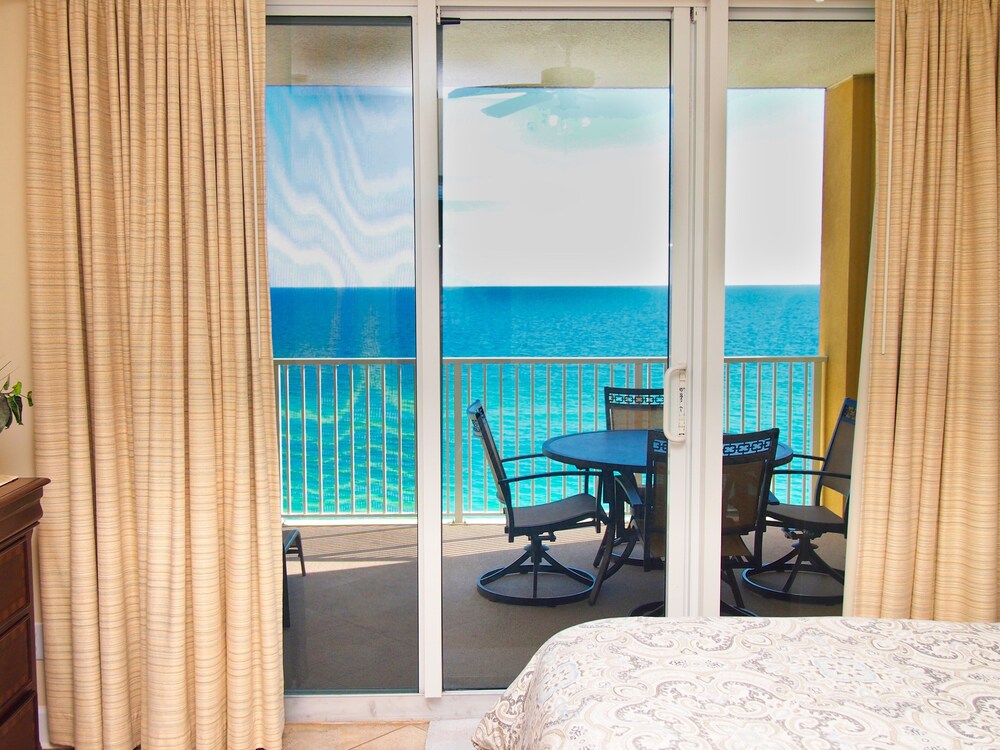 Relax and Enjoy this Tropic Winds 2/2 Condo w/ XL Balcony and Beach Service!