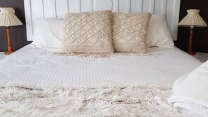 Blackout curtains, iron/ironing board, free WiFi, linens