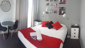 Blackout curtains, iron/ironing board, free WiFi, linens