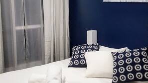 Blackout curtains, iron/ironing board, free WiFi, linens