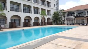 Seasonal outdoor pool, pool umbrellas, sun loungers