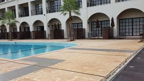 Seasonal outdoor pool, pool umbrellas, sun loungers