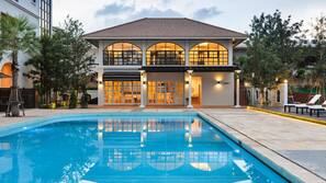 Seasonal outdoor pool, pool umbrellas, sun loungers