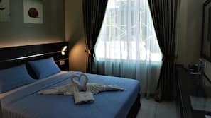In-room safe, desk, blackout curtains, iron/ironing board