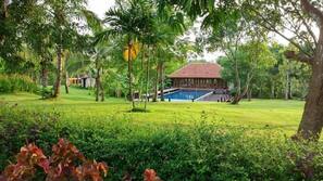 Outdoor pool, open 6 AM to 10:00 PM, sun loungers