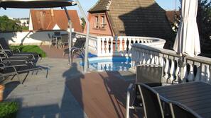 Seasonal outdoor pool, a rooftop pool