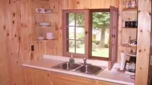 Fridge, microwave, stovetop, coffee/tea maker