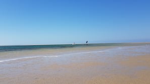 On the beach, beach towels