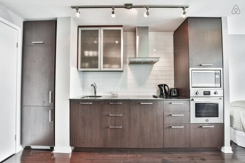 Check Expedia for Availability of Modern Skyscraper Studio by CN Tower