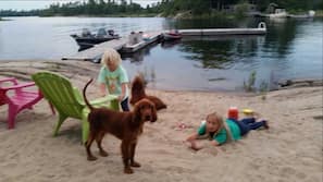 On the beach, sun loungers, beach towels