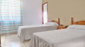 Blackout curtains, rollaway beds, free WiFi, linens