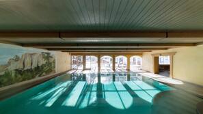 Indoor pool, outdoor pool, pool umbrellas, sun loungers