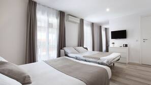 Desk, blackout curtains, free WiFi, linens