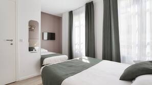 Desk, blackout curtains, free WiFi, linens