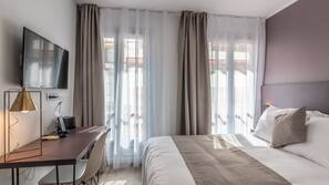 Desk, blackout curtains, free WiFi, linens