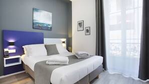 Desk, blackout curtains, free WiFi, linens