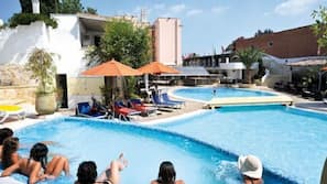 Outdoor pool, pool umbrellas, pool loungers