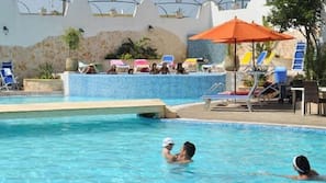 Outdoor pool, pool umbrellas, pool loungers