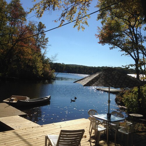 Great Place to stay Escape to Your own Private Cove! Year Round Enjoyment at This Lakefront Cottage! near Byram Township 