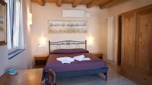 1 dormitorio, colchones con acolchado adicional, escritorio