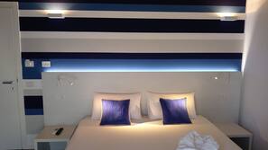 Luxe beddengoed, een kluis op de kamer, een bureau, gratis wifi
