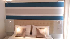 Luxe beddengoed, een kluis op de kamer, een bureau, gratis wifi