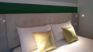Luxe beddengoed, een kluis op de kamer, een bureau, gratis wifi