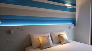 Luxe beddengoed, een kluis op de kamer, een bureau, gratis wifi