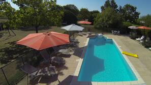 2 outdoor pools, pool umbrellas, pool loungers