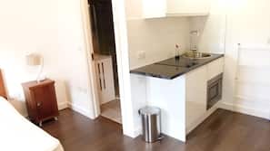 Fridge, microwave, stovetop, cookware/dishes/utensils