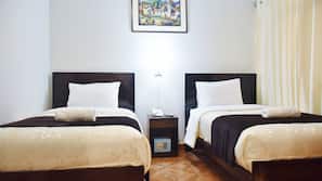 Roupas de cama premium, edredons de pluma, cofres nos quartos