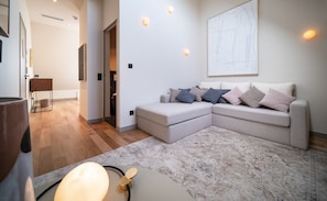 Superior Room | Living area | 49-inch LED TV with satellite channels, TV, streaming services