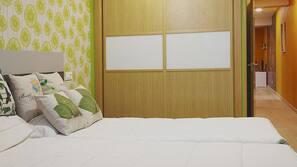 Blackout drapes, iron/ironing board, free cribs/infant beds, free WiFi