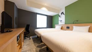 Een kluis op de kamer, een bureau, verduisterende gordijnen, gratis wifi