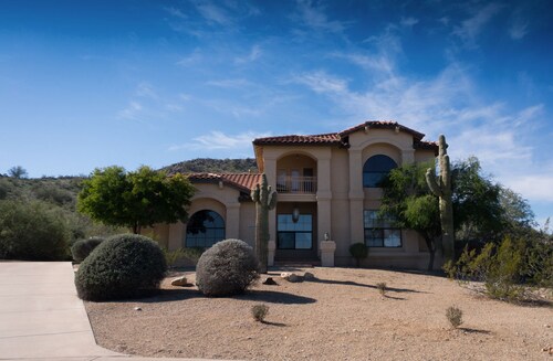 Great Place to stay Estrella Mtn Custom 3bed/3ba/slps 8/pool/spa/gas Firepit/golf/views near Goodyear 