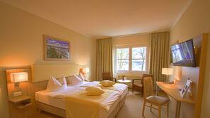 Hypo-allergenic bedding, desk, blackout drapes, soundproofing