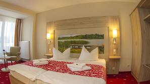Hypo-allergenic bedding, desk, blackout drapes, soundproofing