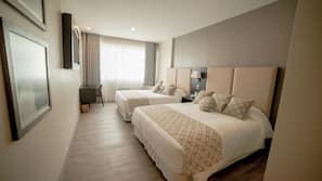 Ropa de cama de alta calidad, minibar, caja fuerte y escritorio