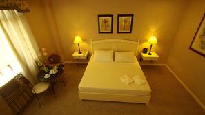 Premium bedding, desk, iron/ironing board, rollaway beds