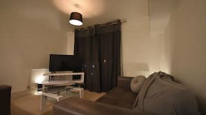 1 bedroom, premium bedding, blackout curtains, iron/ironing board