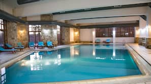 Indoor pool, seasonal outdoor pool, open 6 AM to 9:00 PM, pool umbrellas