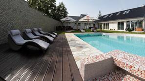 Indoor pool, seasonal outdoor pool, pool umbrellas