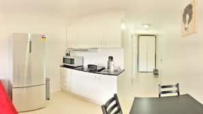Fridge, microwave, electric kettle, cookware/dishes/utensils